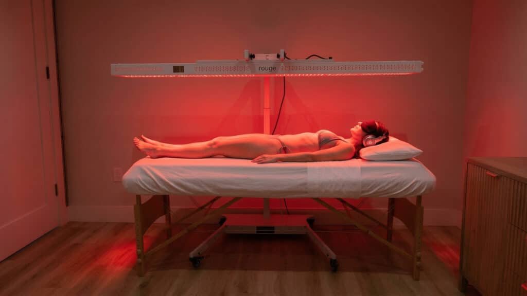 Woman receiving red light therapy at Goji Yoga & Wellness in Oakville